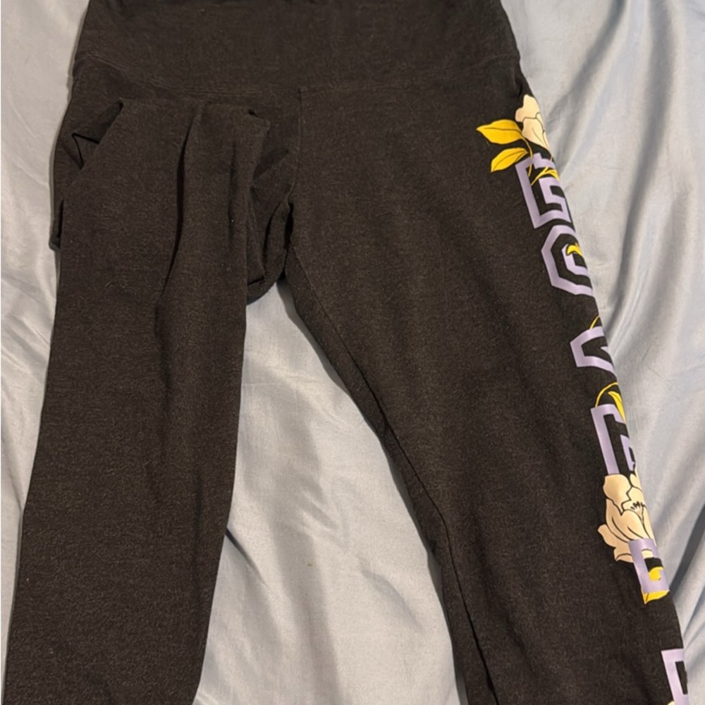 PINK Victoria's Secret Black Leggings with Yellow and Purple Floral Design